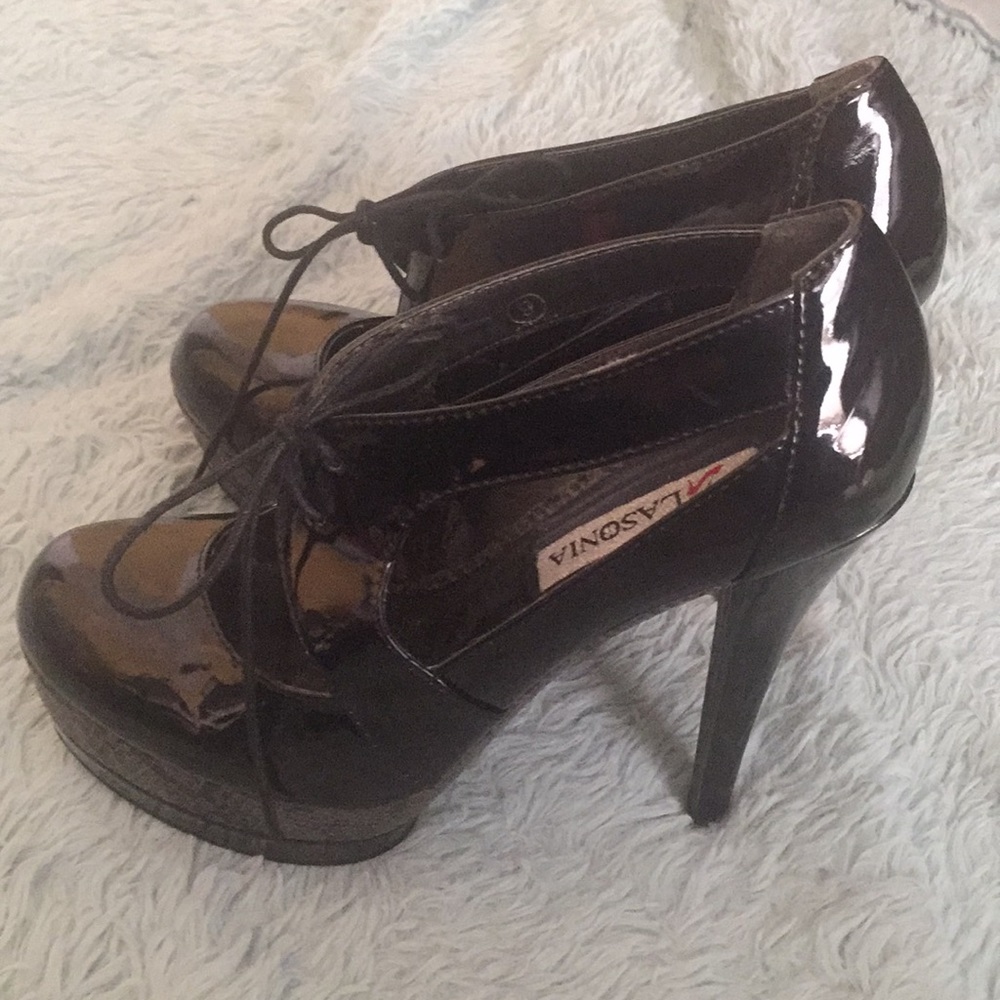 Black snakeskin stilettos